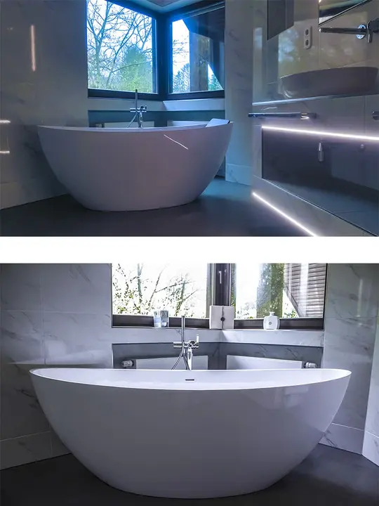 Modernes Badezimmer mit Badewanne und LED-Beleuchtung